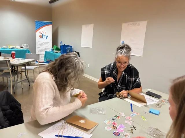 Participants taking part in a craft activity at the Wellness Gathering.